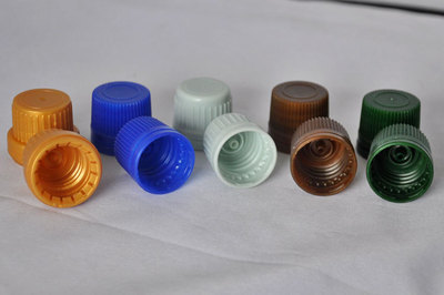 供應(yīng)18口徑精油瓶用塑料蓋 大頭保險(xiǎn)蓋與防盜蓋的全面解析